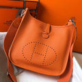 HERM Evelyne III 29 PM Bag In Orange Clemence Leather