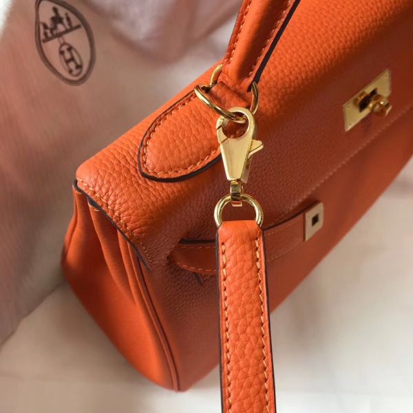 HERM Kelly 25cm Retourne Bag In Orange Togo Leather