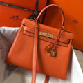 HERM Kelly 25cm Retourne Bag In Orange Togo Leather